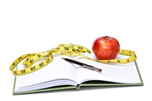 Book With Apple, Pen, and Measuring Tape - weight loss programs in charlotte