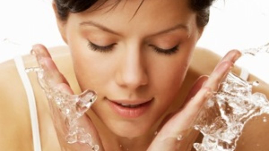 Woman Washing Face - diabetes testing in charlotte