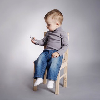 Child Sitting In Chair - charlotte food sensitivity testing