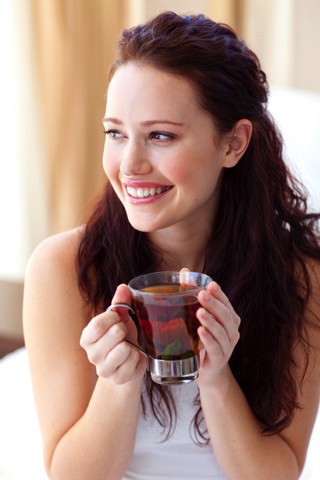 Woman Drinking Tea - charlotte hormone imbalance treatment