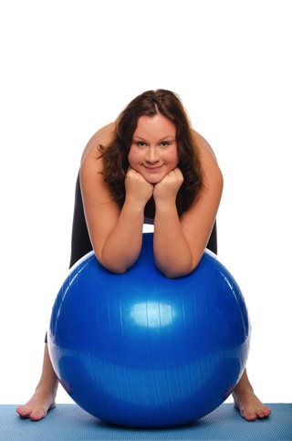 Woman Leaning On Blue Ball - weight loss programs in charlotte
