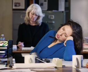 Women Sleeping At Office - hormone imbalance treatment in charlotte