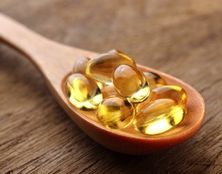 Fish Oil In Spoon - hormone imbalance treatment in charlotte