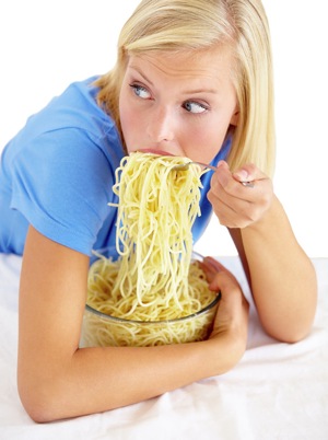 Woman Eating Noodles - charlotte weight loss programs