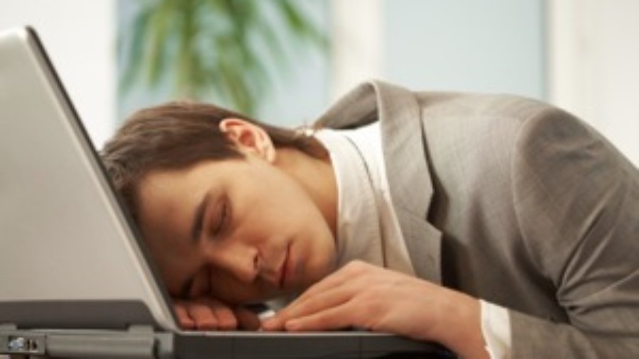 Man Sleeping At Computer - charlotte hormone imbalance treatment