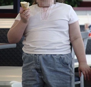 Obese Man Eating Ice Cream - charlotte weight loss programs