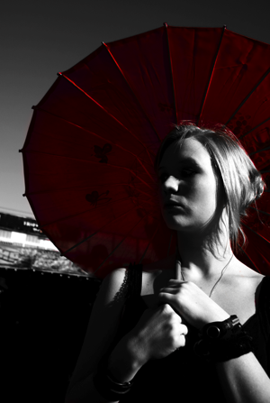 Woman Holding Umbrella - charlotte hormone imbalance treatment