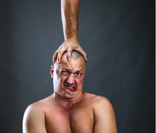 Man With Hand On His Head - charlotte crohn's disease treatment