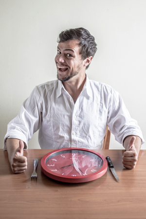 Happy Man With Clock On Table - charlotte crohn's disease treatment