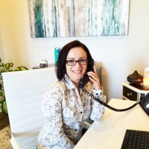 Smiling Woman On Phone - charlotte crohn's disease treatment